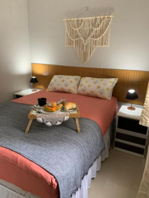 Apartamento na praia com Ar Condicionado